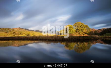 The River Brathay and the Langdale Pikes in the English Lake District National Park Stock Photo