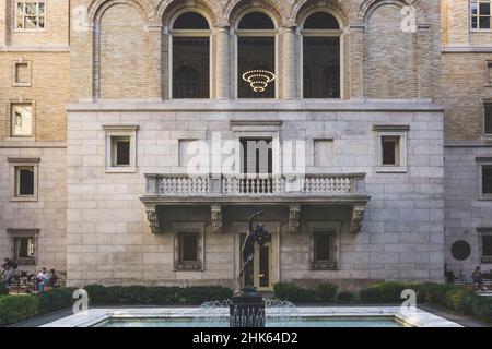 Boston, USA - October 22, 2021: Vintage look of a sculpture on the courtyard of the Mckim building of Boston Public Library Stock Photo