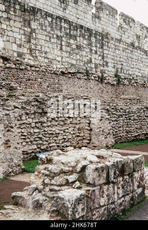 Remains of a Roman fort and the settlement Eboracum in York, base for the Roman Ninth Legion. Medieval and Roman walls. Archival scan from a slide. July 1974 Stock Photo