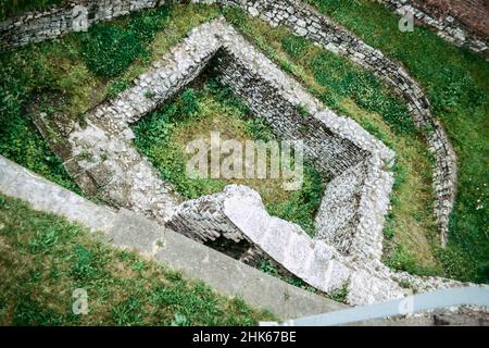 Remains of a Roman fort and the settlement Eboracum in York, base for the Roman Ninth Legion. Corner tower. Archival scan from a slide. October 1979 Stock Photo