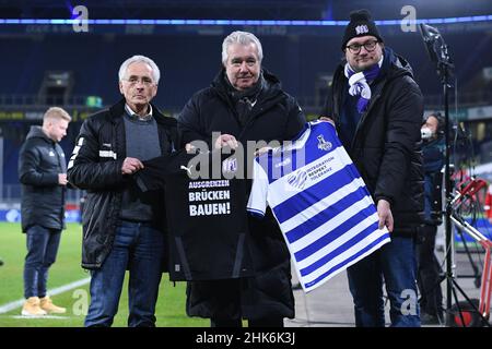 02 February 2022, North Rhine-Westphalia, Duisburg: Soccer: 3rd league 20th matchday MSV Duisburg - VfL Osnabrück at the Schauinsland-Reisen Arena. Ingo Wald, President of MSV Duisburg (l-r), Peter Frymuth, Vice President of the DFB, and Michael Welling, Managing Director of VfL Osnabrück, present the special matchday jerseys. In the 3rd division replay between the two teams, they want to use the special jerseys to send a signal against exclusion. The match was initially interrupted by the referee on December 19 and later abandoned. Osnabrück player Aaron Opoku had previously been subjected to Stock Photo