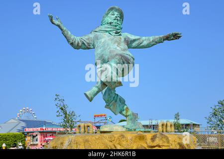 Jolly Fisherman sculpture fountain on seafront promenade, Skegness, Lincolnshire, England, United Kingdom Stock Photo