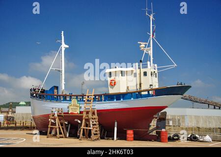Wooden fishing boat in dry dock, Dover, Kent, England, United Kingdom Stock Photo