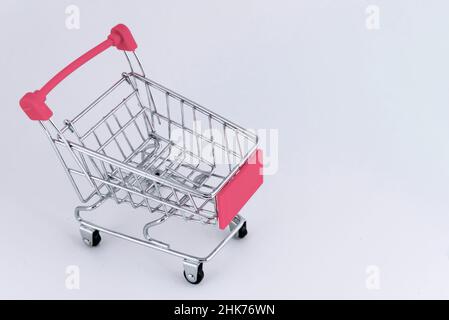 pink shopping cart completely empty Stock Photo