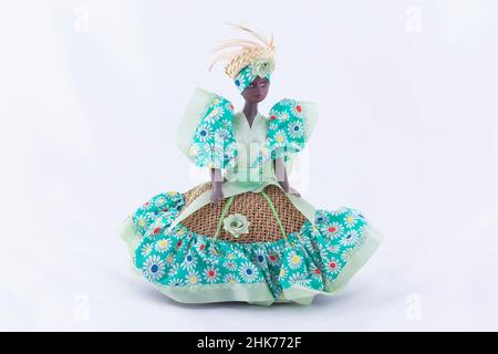 A Handmade Black Doll On White Background Stock Photo