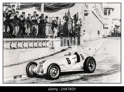 Hermann Lang  Mercedes No 6 at Montenero 1937 coming in a very close second to his Mercedes team mate. The 1937 Italian Grand Prix was held on September 12 at the Montenero Circuit near Livorna. Polesitter Rudolf Caracciola won a tough battle with Mercedes o Hermann Lang less than a second behind at the finish. Bernd Rosemeyer was third in an Auto Union. Stock Photo