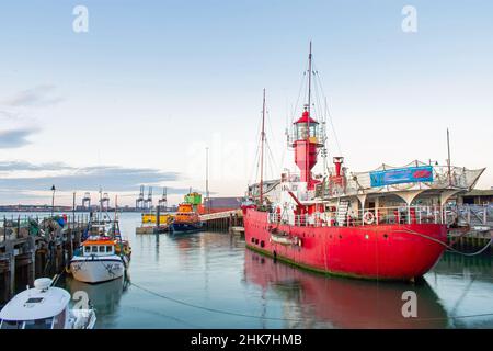 Light vessel 18 famous as 'The boat that rocked' and pirate radio station Caroline permanently docked in Harwich harbour by the historic Ha'penny Pier. Stock Photo
