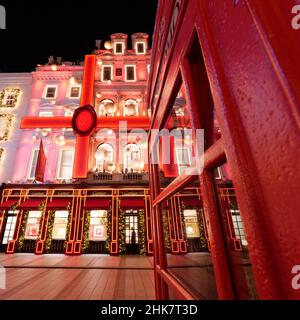 London, Greater London, England, January 4th 2022: Telephone Box and Cartier Jewellers festive Christmas facade on New Bond Street at night. Stock Photo