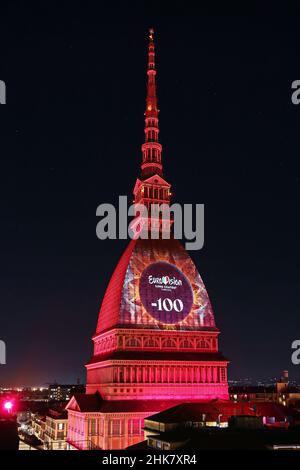 Eurovision Song Contest logo projected on the Mole Antonelliana. The 66th edition will be held in Turin in May 2022. Turin, Italy - February 2022 Stock Photo