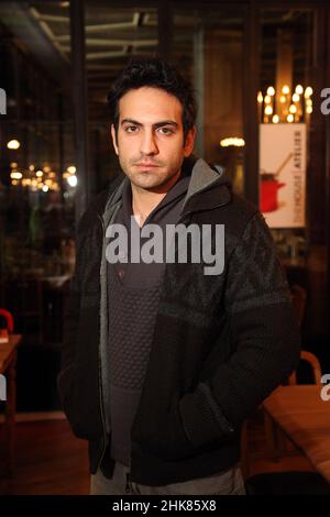 ISTANBUL, TURKEY - JANUARY 31: Famous Turkish actor Bugra Gulsoy portrait in Taksim Square on January 31, 2012 in Istanbul, Turkey. Stock Photo