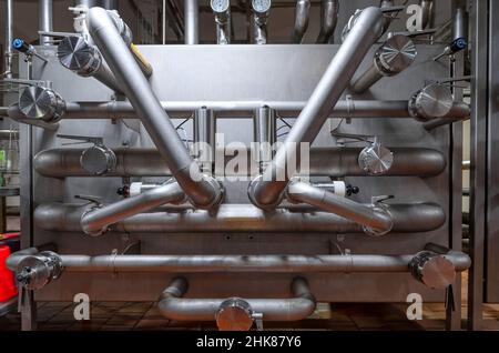 Heavy duty steel pipelines for pumping liquids. Stock Photo