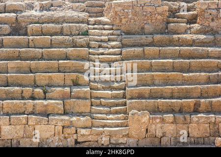 The ancient steps and seating in the ruins of the Hippodrome at Caesarea National Park in Caesarea Maritima, Israel Stock Photo