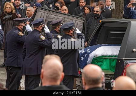 NEW YORK, NEW YORK - FEBRUARY 02: The casket of fallen NYPD officer Wilbert Mora is brought out of St. Patrick's Cathedral on February 02, 2022 in New York City. Officer Mora, and his partner Officer Jason Rivera, were killed when a gunman ambushed them in an apartment as they responded to a family dispute. Stock Photo