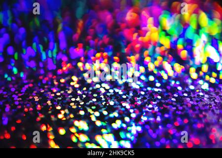 Neon rainbow glittering lights with glow effect abstract background Stock Photo