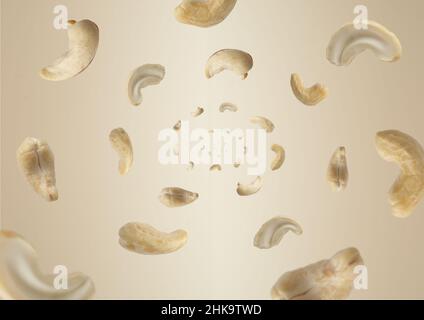 Close up photo of floating raw organic cashews on beige background. Stock Photo