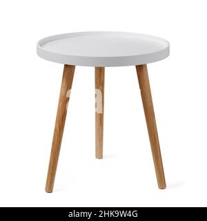 Round coffee table or end table isolated on white background with clipping path. Small round white table with 3 legs on white background. Stock Photo