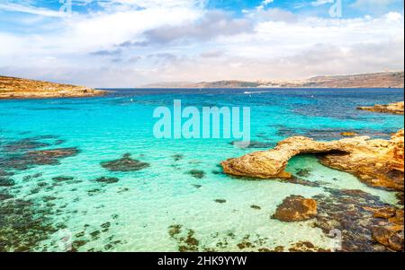 Turquoise lagoon near the Comino island between the islands of Malta and Gozo in the Mediterranean Sea, Europe. Stock Photo