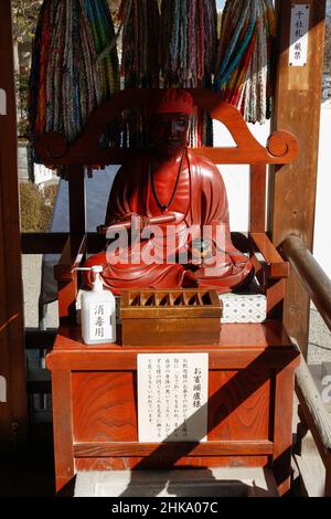 Iida, nagano, japan, 2022/03/02 , Statue of Binzuru (Pindola Bharadvaja) in Motozenjoji temple. Binzuru is an Arhat in Buddhism. According to the earl Stock Photo