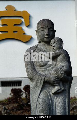 Iida, nagano, japan, 2022/03/02 , statue at Motozenkouji Temple. It has a strong relationship with Zenkoji Temple in Nagano City, and locals say it is Stock Photo