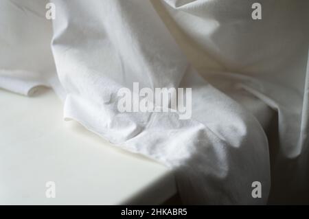 White linen abstract folded texture background Stock Photo