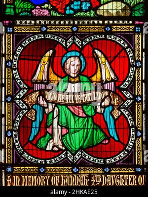 Stained glass window Pakenham church, Suffolk, England, UK c 1862 William Wailes detail of winged angel Stock Photo