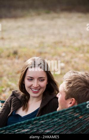 Young couple laying in hammock Stock Photo