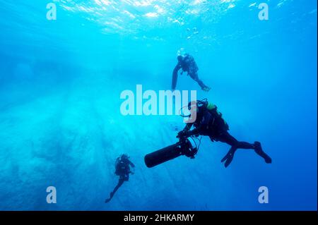 Underwater archaeologists digging BC 2nd century shipwreck in Bozburun Marmaris Turkey. Underwater archaeologists digging BC 2nd century shipwreck in Bozburun Marmaris Turkey.