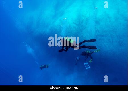 Underwater archaeologists digging BC 2nd century shipwreck in Bozburun Marmaris Turkey. Underwater archaeologists digging BC 2nd century shipwreck in Bozburun Marmaris Turkey.