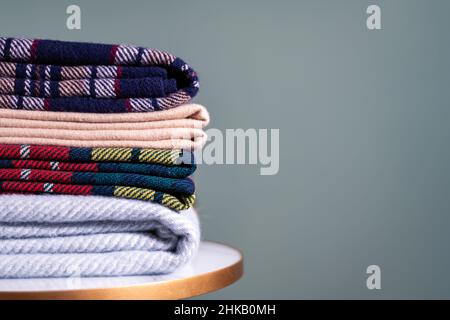 Stack of woolen checked blankets Stock Photo