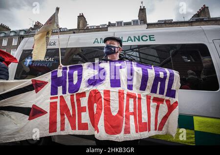 London, UK. 3rd Feb 2022. Security guards from Great Ormond Street Hospital (GOSH) begin a six-week strike from 2nd Feb until 18th March. The strike action is calling for an end to outsourcing and demands better and fairer working condition including maternity cover, annual leave, injury and overtime pay - similar to the rest of the hospital staff. GOSH security guards are proud to be key workers but claim they have been denied the same recognition and rewards as their NHS colleagues. Credit: Guy Corbishley/Alamy Live News Stock Photo