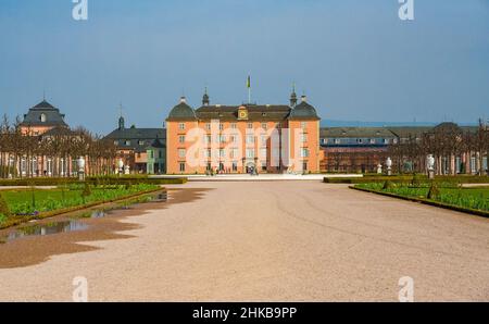 Lovely panoramic view of the main building of the famous Schwetzingen Palace seen from the English-style landscape garden in spring. The palace owes... Stock Photo