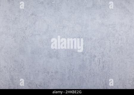 the texture of the coarse surface of the wall covered with decorative plaster Stock Photo