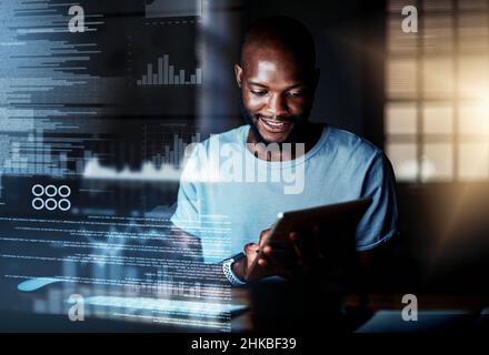 Deciphering new data. Shot of a programmer using a digital tablet while working on a computer code at night. Stock Photo