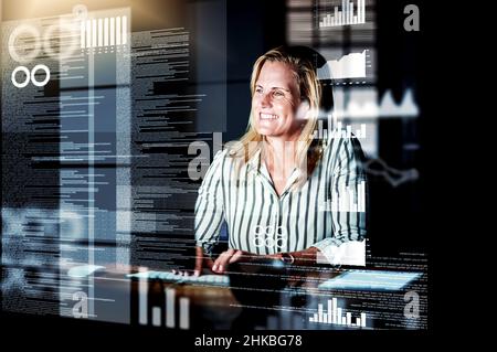 Advancing through cyberspace. Shot of a programmer working on a computer code at night. Stock Photo