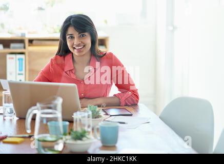 Working on a brand new design. Cropped portrait of a female designer working on a creative project at her desk. Stock Photo
