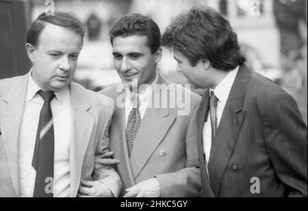 Los Angeles, CA, USA, 1994. Romanian sport commentators Cristian Topescu & Ionel Stoica with soccer player Gheorghe Hagi (center). Stock Photo