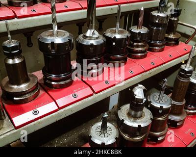 machining metal and plastic blanks on a multi-profile CNC machine Stock Photo