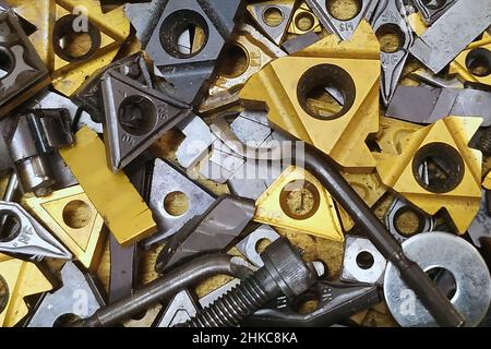 machining metal and plastic blanks on a multi-profile CNC machine Stock Photo
