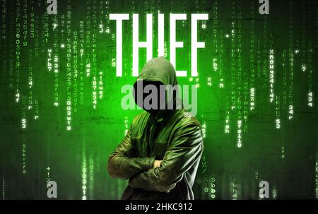 Faceless hacker with inscription Stock Photo