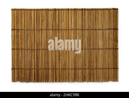 Brown bamboo table mat isolated on a white background. Old wooden luncheon mat for place your food. Textured surface of empty dining placemat. Stock Photo