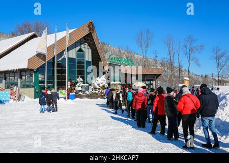 Zakopane, Poland. 29 January 2022. Tourists stand in the queue to the cable railway to Gubałówka. Credit: Waldemar Sikora Stock Photo