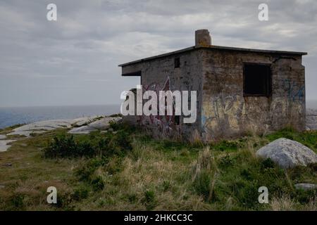 crumbling ruins of WW2 era  lookout bunker Stock Photo