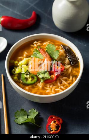 Instant Spicy Seafood Ramen with Shrimp and Peppers Stock Photo