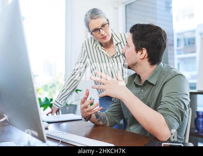 Merging their ideas into something that works Stock Photo