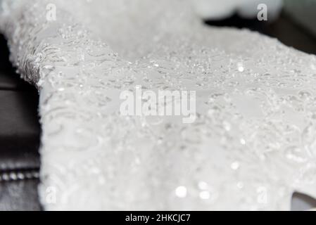 Close up of the wedding dress before the bride wears it on the day of her marriage. Stock Photo