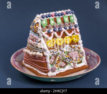 Traditional ginger bread house on a plate Stock Photo