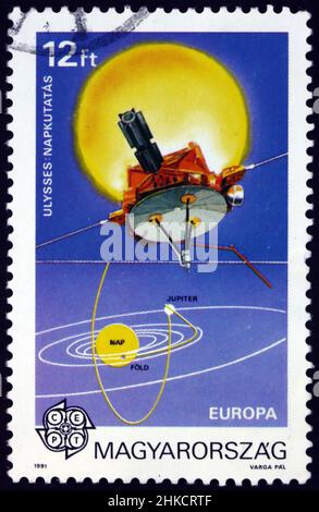 HUNGARY - CIRCA 1991: a stamp printed in Hungary shows Ulysses robotic space probe, was launched in 1990 and made three scans of the Sun, circa 1991 Stock Photo