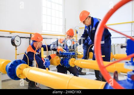 Gas distribution center. an engineer working in the operating room Stock Photo
