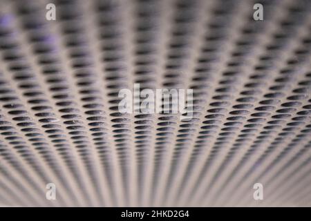 A focused holes of a speaker box from top Stock Photo