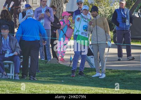 Pebble Beach, USA. 03rd Feb, 2022. Mookie Betts putts onto the 6th green at  Monterey Peninsula Club during the first round of the AT&T Pro-Am PGA Tour  golf event Monterey Peninsula, California